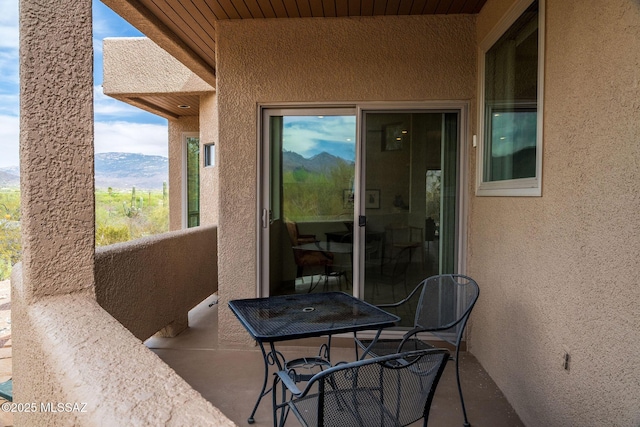 view of patio / terrace with a balcony