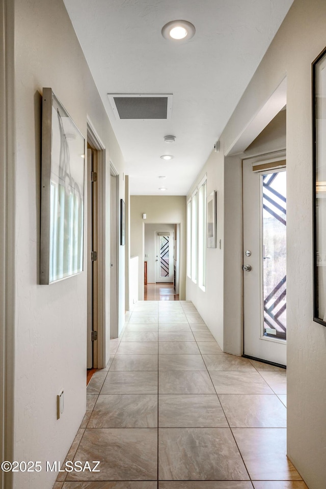 corridor featuring visible vents