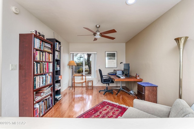 office area featuring a ceiling fan and wood finished floors