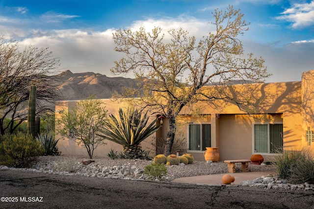 exterior space featuring a mountain view