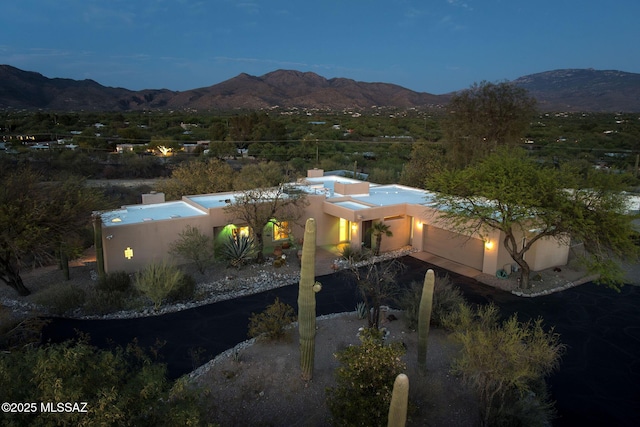 exterior space featuring a mountain view