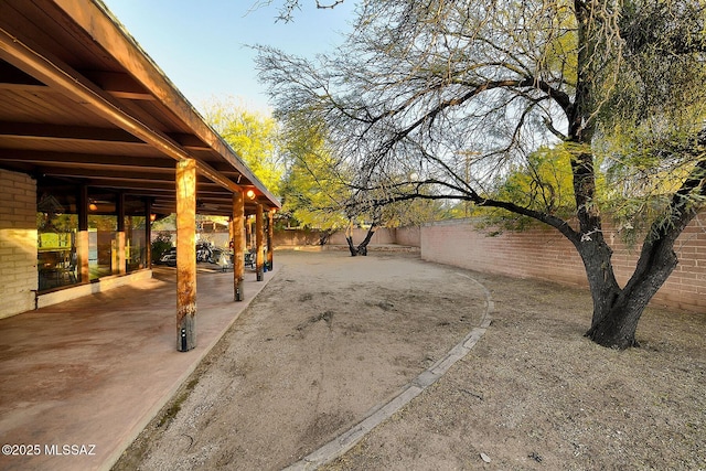 view of yard with a patio area and a fenced backyard