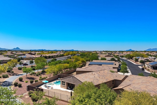 aerial view featuring a mountain view and a residential view