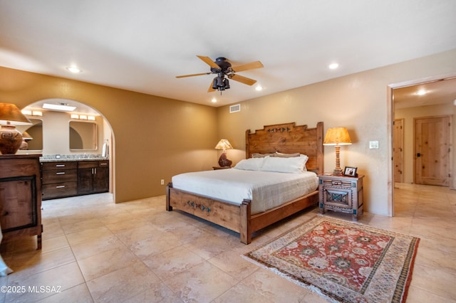 bedroom featuring ceiling fan, ensuite bathroom, visible vents, and recessed lighting