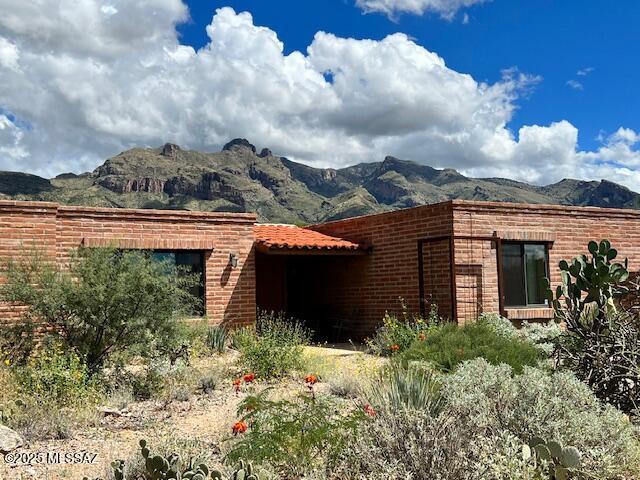 exterior space featuring a mountain view