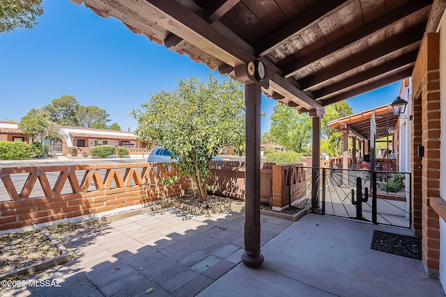 view of patio with fence