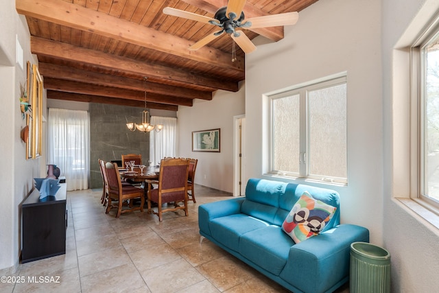 6261 N Placita De Rojelio, Tucson, AZ 85718 - dining area with wood ceiling, beam ceiling, a chandelier, light tile patterned flooring, and ceiling fan