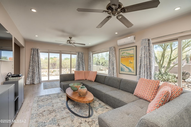 6261 N Placita De Rojelio, Tucson, AZ 85718 - living room featuring an AC wall unit, recessed lighting, ceiling fan, and light wood finished floors