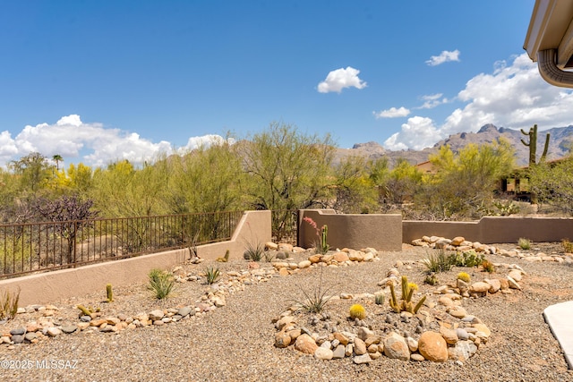 6261 N Placita De Rojelio, Tucson, AZ 85718 - view of yard featuring fence and a mountain view