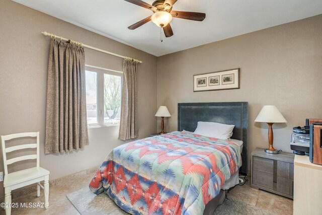 6261 N Placita De Rojelio, Tucson, AZ 85718 - bedroom featuring a ceiling fan