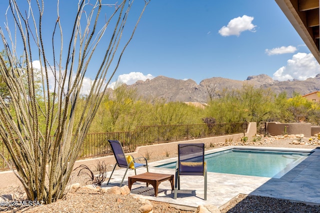6261 N Placita De Rojelio, Tucson, AZ 85718 - view of pool with a patio, a mountain view, and a fenced backyard