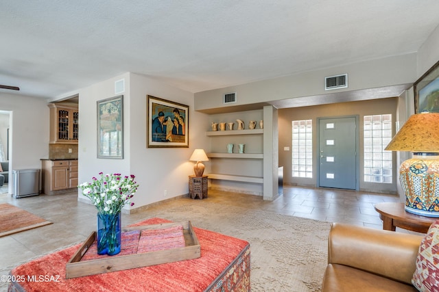 6261 N Placita De Rojelio, Tucson, AZ 85718 - living area with built in shelves