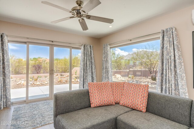 6261 N Placita De Rojelio, Tucson, AZ 85718 - interior space featuring wood finished floors, a ceiling fan, recessed lighting, and a wall mounted AC