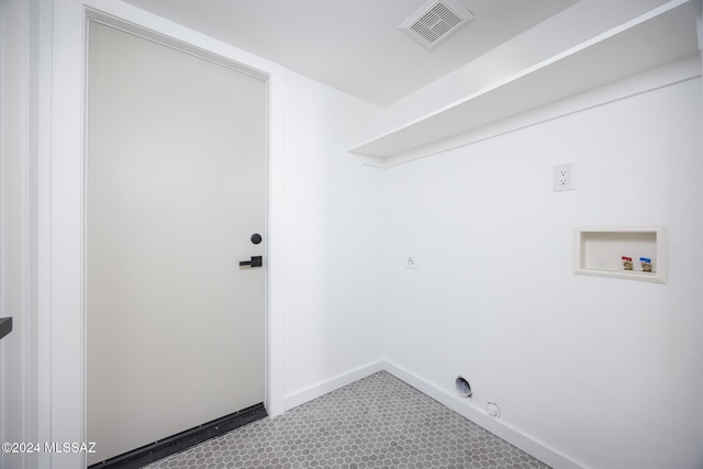 laundry room with laundry area, visible vents, baseboards, gas dryer hookup, and washer hookup