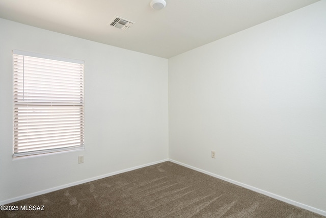 2414 E Calle Lena Verde, Tucson, AZ 85706 - carpeted spare room featuring baseboards