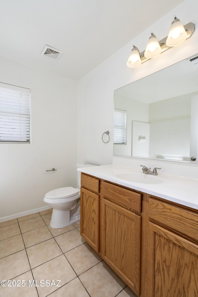 2414 E Calle Lena Verde, Tucson, AZ 85706 - bathroom featuring vanity, tile patterned flooring, and toilet