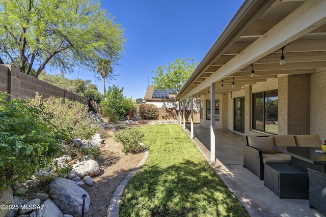 9810 E Amaroso Ln, Tucson, AZ 85748 - view of yard with a fenced backyard and a patio area