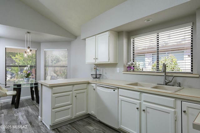 9810 E Amaroso Ln, Tucson, AZ 85748 - kitchen featuring a sink, white dishwasher, vaulted ceiling, a peninsula, and white cabinets