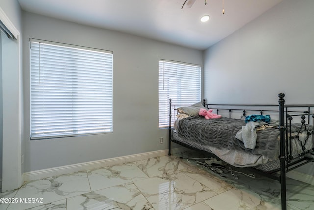 bedroom featuring baseboards, recessed lighting, vaulted ceiling, and marble finish floor