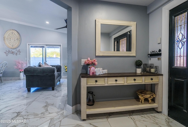 foyer entrance with recessed lighting, marble finish floor, and baseboards