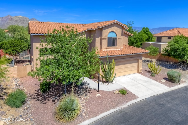 5476 N Indian Trl, Tucson, AZ 85750 - mediterranean / spanish house featuring stucco siding, a mountain view, and a tiled roof