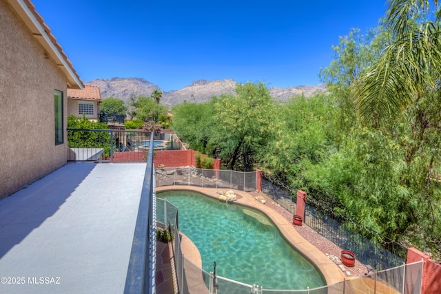 5476 N Indian Trl, Tucson, AZ 85750 - view of pool with a fenced backyard, a mountain view, a patio area, and a fenced in pool