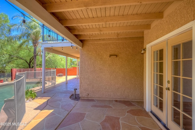 5476 N Indian Trl, Tucson, AZ 85750 - view of patio / terrace featuring fence, a fenced in pool, and french doors