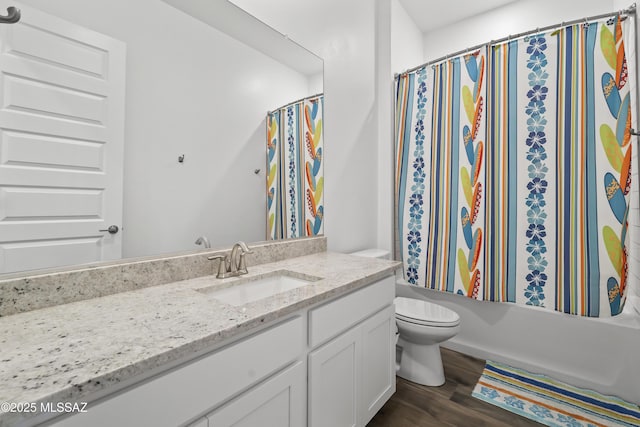 full bathroom with toilet, vanity, shower / tub combo with curtain, and wood finished floors