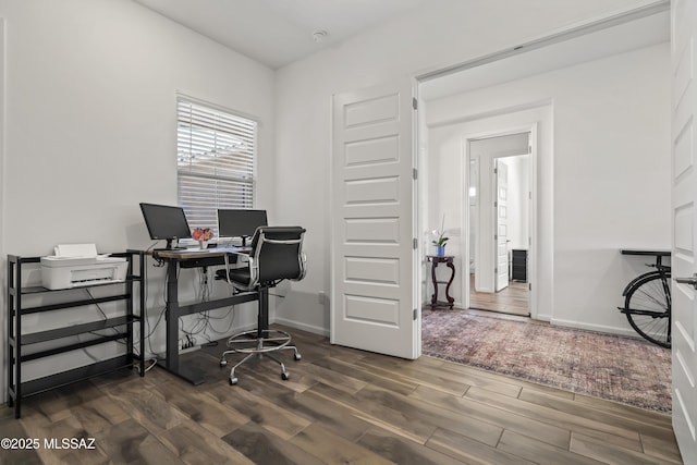 home office with wood finished floors and baseboards