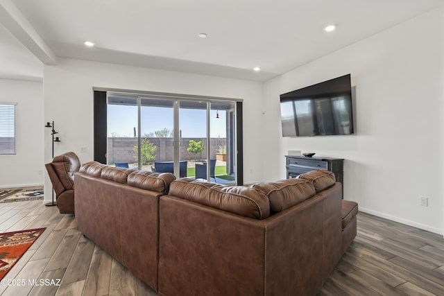 living room featuring wood finished floors, plenty of natural light, and recessed lighting