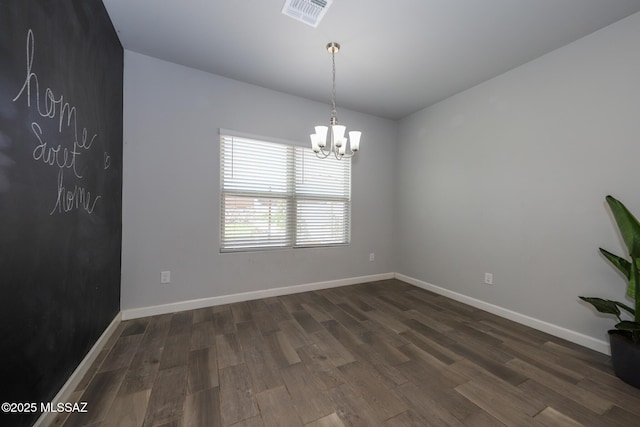 491 W Camino Del Toro, Vail, AZ 85641 - unfurnished room featuring dark wood-type flooring, a chandelier, and baseboards