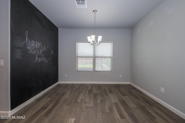 491 W Camino Del Toro, Vail, AZ 85641 - unfurnished room featuring a chandelier, dark wood-style floors, and baseboards