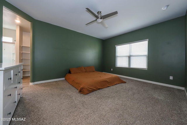 491 W Camino Del Toro, Vail, AZ 85641 - unfurnished bedroom with baseboards, carpet floors, ceiling fan, and vaulted ceiling