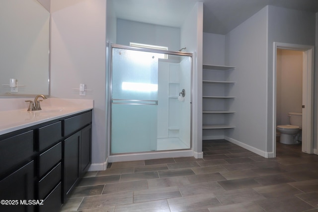 491 W Camino Del Toro, Vail, AZ 85641 - bathroom with a stall shower, toilet, vanity, and baseboards