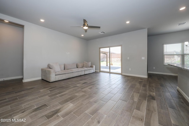 491 W Camino Del Toro, Vail, AZ 85641 - living room featuring healthy amount of natural light, a ceiling fan, baseboards, wood finished floors, and recessed lighting