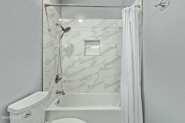 10658 E Rose Hill St, Tucson, AZ 85747 - bathroom with a textured wall, shower / tub combo, and toilet