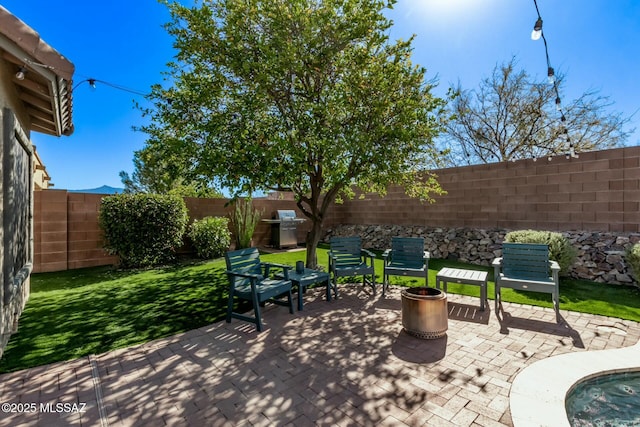 10658 E Rose Hill St, Tucson, AZ 85747 - view of patio / terrace featuring a fenced backyard and a grill