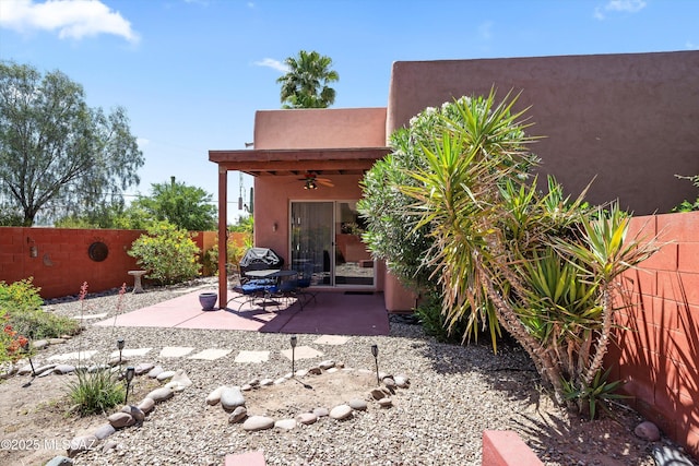 view of patio / terrace featuring a ceiling fan and a fenced backyard