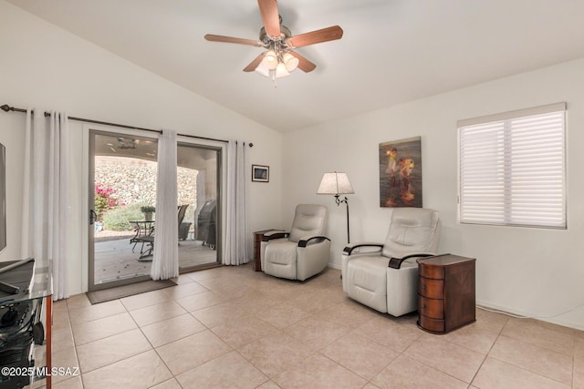 5354 W Eagle Claws Ct, Marana, AZ 85658 - living area with light tile patterned floors, ceiling fan, and vaulted ceiling