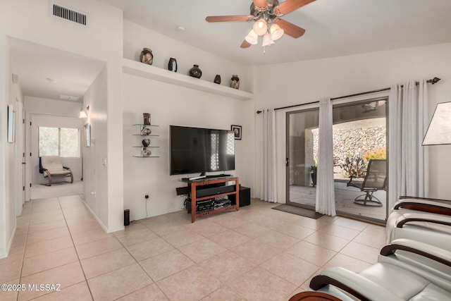 5354 W Eagle Claws Ct, Marana, AZ 85658 - living room featuring visible vents, ceiling fan, and light tile patterned flooring