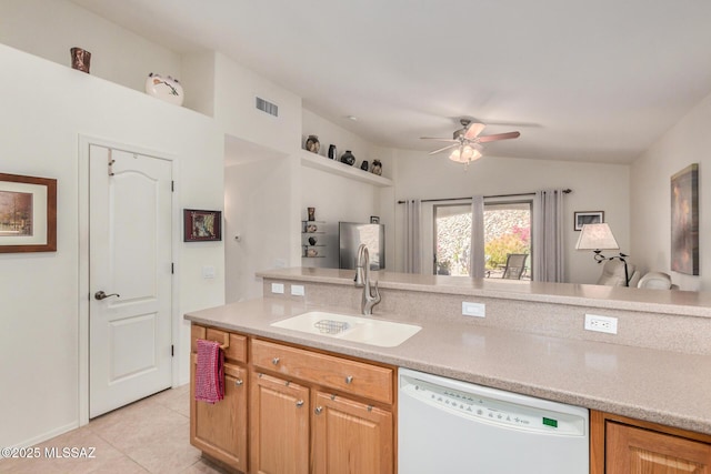 5354 W Eagle Claws Ct, Marana, AZ 85658 - kitchen featuring light tile patterned floors, ceiling fan, dishwasher, a sink, and visible vents