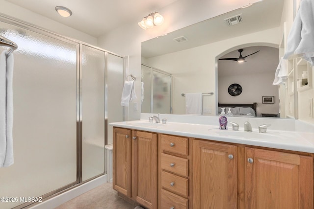 5354 W Eagle Claws Ct, Marana, AZ 85658 - ensuite bathroom featuring visible vents, connected bathroom, and a stall shower