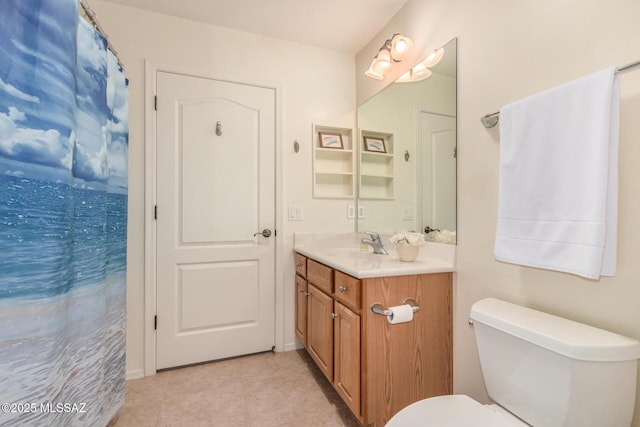 5354 W Eagle Claws Ct, Marana, AZ 85658 - full bath with tile patterned floors, vanity, and toilet