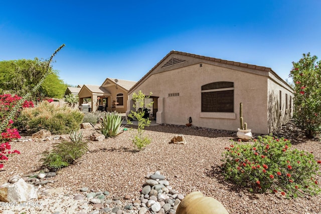 5354 W Eagle Claws Ct, Marana, AZ 85658 - rear view of house featuring stucco siding