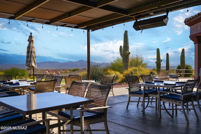 5354 W Eagle Claws Ct, Marana, AZ 85658 - view of patio with a mountain view and outdoor dining area