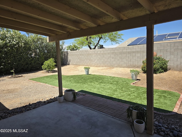 view of patio with a fenced backyard