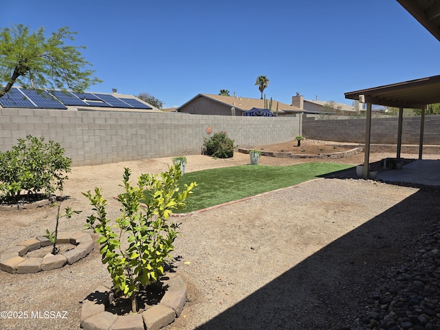 view of yard with a patio area and a fenced backyard