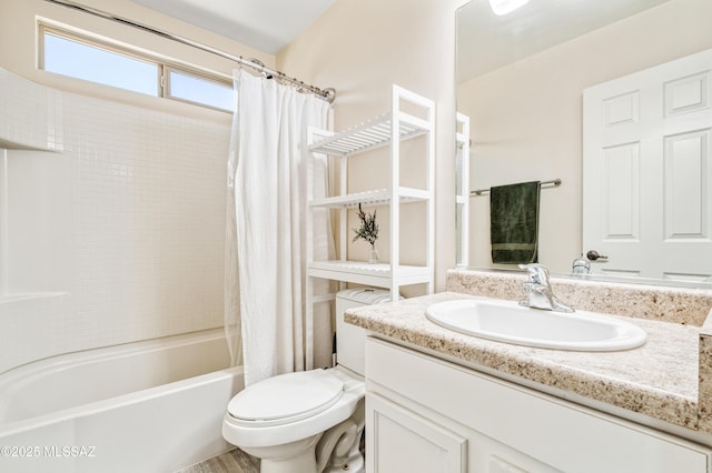 bathroom featuring toilet, vanity, and shower / bathtub combination with curtain