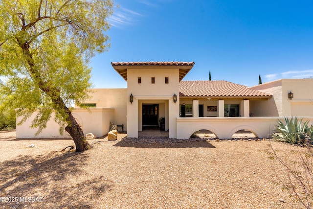 4644 N Avenida Del Cazador, Tucson, AZ 85718 - view of front of property featuring stucco siding, a tile roof, and fence