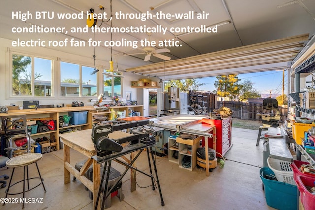 925 W 4th Ave, San Manuel, AZ 85631 - miscellaneous room featuring a workshop area, a ceiling fan, and concrete flooring